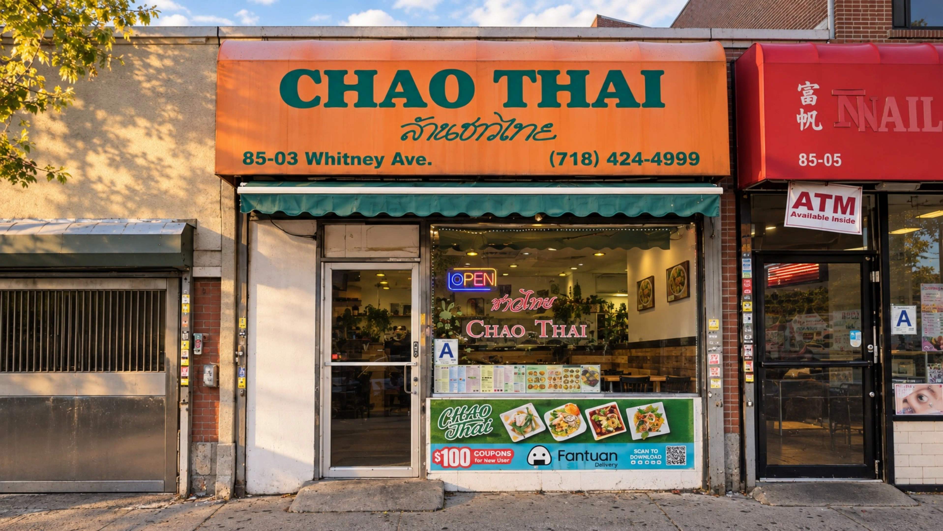 Chao Thai storefront on Whitney Avenue: orange awning with green lettering, a green scalloped awning, the entrance door on the left and the display window on the right.